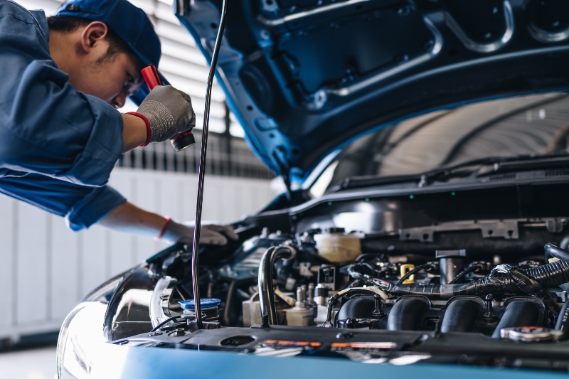 maintenance-worker-checking-tire-service-via-insur-2025-02-10-05-41-50-utc